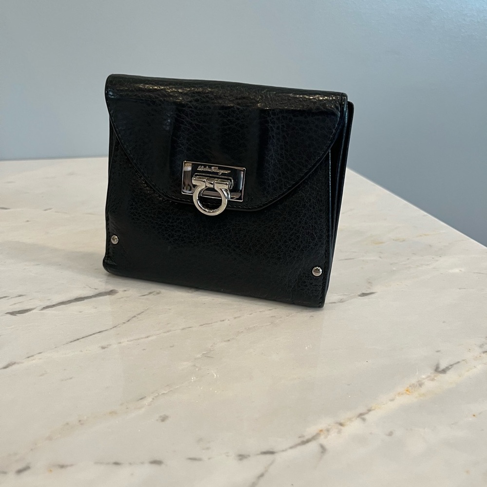 Ferragamo Gancini black leather bifold wallet
